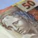 Brasileiros sacam R$ 10,5 bilhões da poupança em agosto diante da Selic em 14% ao ano